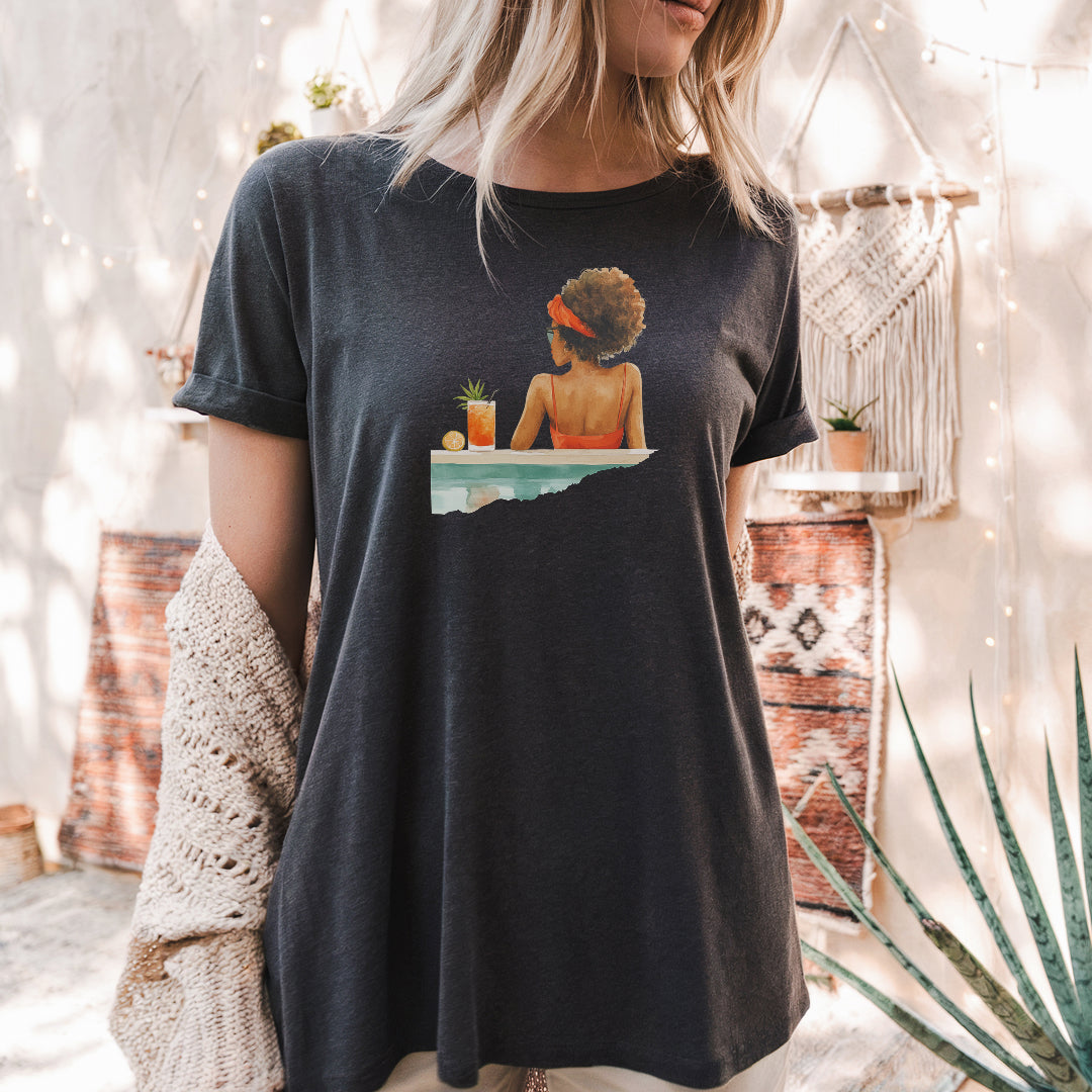a woman wearing a black shirt with a picture of a woman on it