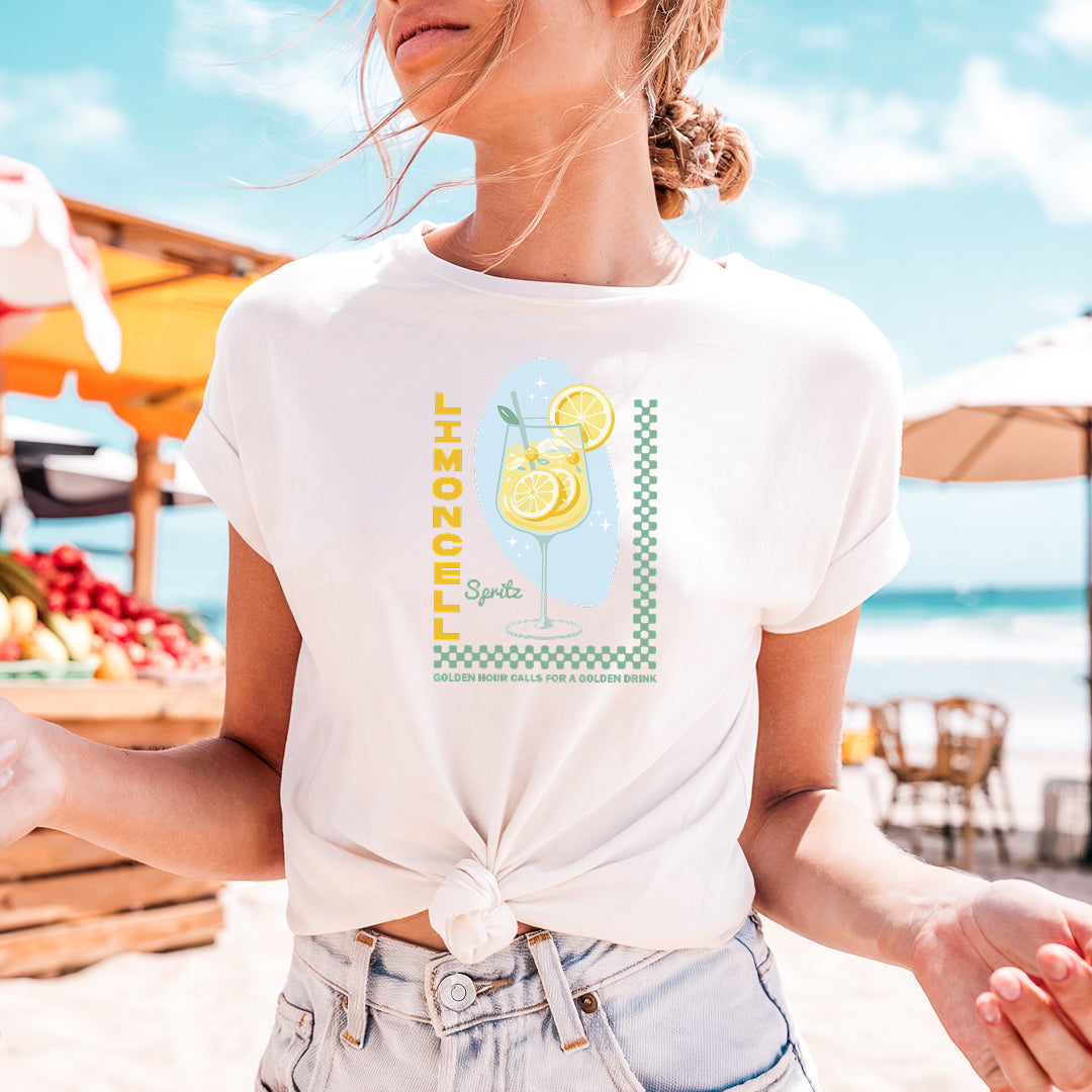 a woman standing on a beach holding a plate of food