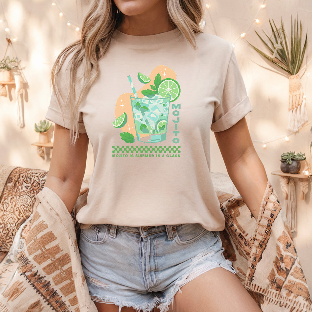a woman sitting on a couch wearing a t - shirt with a picture of a