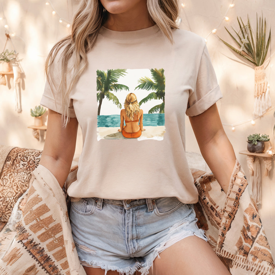 a woman wearing a t - shirt with a picture of a woman sitting on a