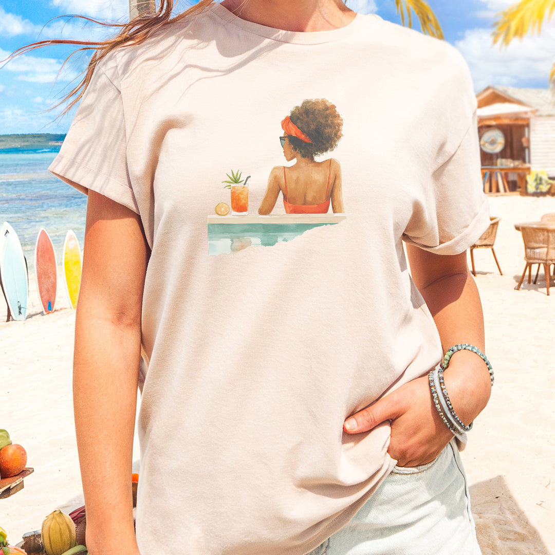 a woman wearing a t - shirt with a picture of a woman sitting on a
