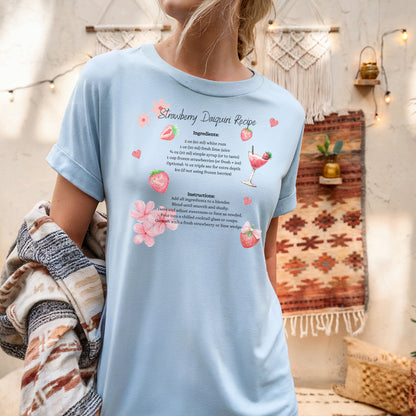 a woman wearing a blue shirt with a poem on it