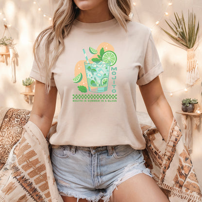 a woman sitting on a couch wearing a t - shirt with a picture of a