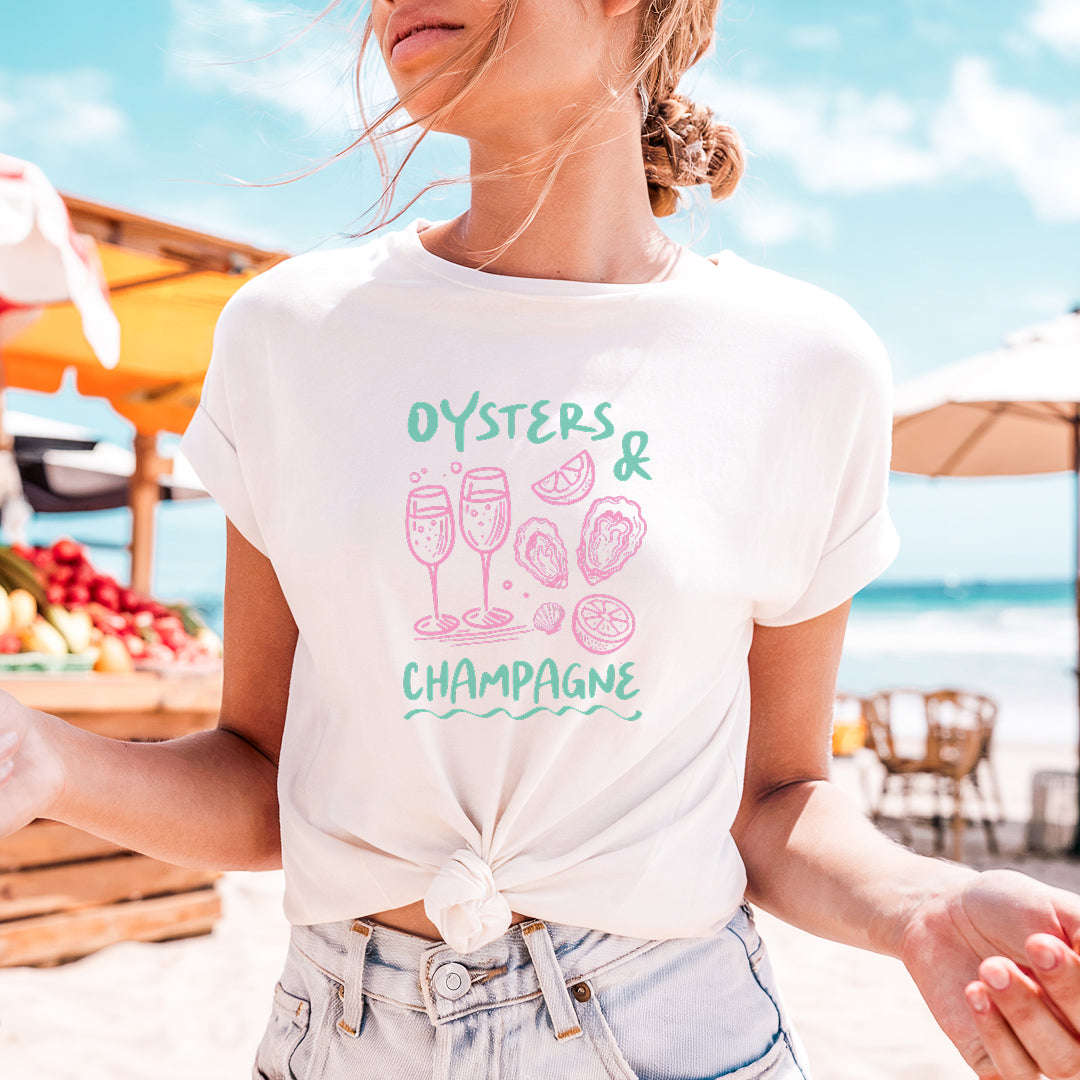 a woman wearing a oysters and champagne t - shirt